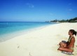 Visitors can enjoy yoga on the beach.